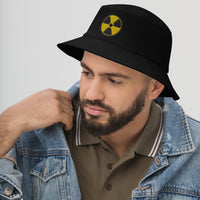 Black bucket hat with Radioactive Sign embroidered artwork, left-front view