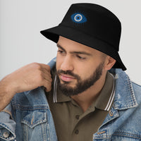 Black bucket hat with The Curse of the Evil Eye embroidered artwork, left-front view