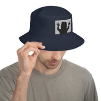 Navy bucket hat with "They're Here" Carol Anne Poltergeist embroidered artwork, front view