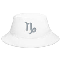 White bucket hat with Zodiac Sign Capricorn embroidered artwork, front view