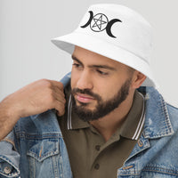 White bucket hat with Black Pagan Triple Moon Goddess embroidered artwork, left-front view