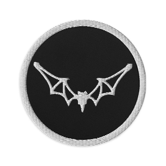 Circular embroidered patch featuring Flying Vampire Frame Bat, front view