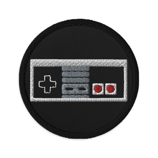 Circular embroidered patch featuring Classic NES Controller, front view