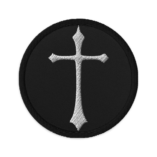 Circular embroidered patch featuring White Gothic Ancient Medeival Cross, front view