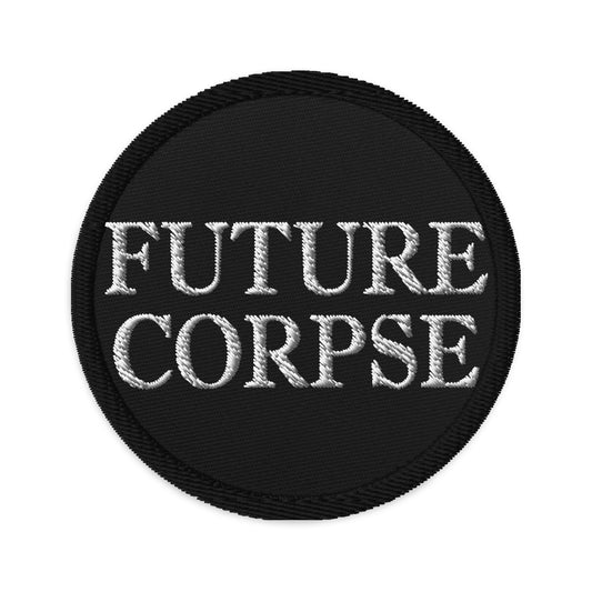 Circular embroidered patch featuring Future Corpse, front view