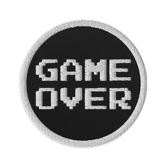 Circular embroidered patch featuring Game Over 8 Bit, front view