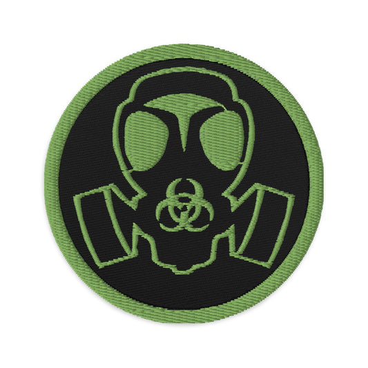 Circular embroidered patch featuring Green Bio Hazard Gas Mask, front view