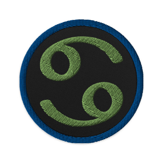 Circular embroidered patch featuring Green Zodiac Sign Cancer, front view