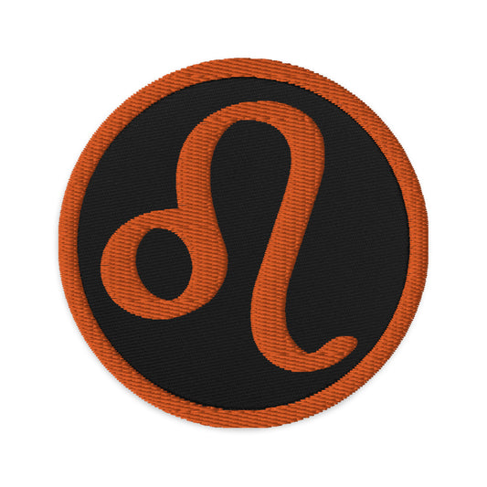 Circular embroidered patch featuring Orange Zodiac Sign Leo, front view