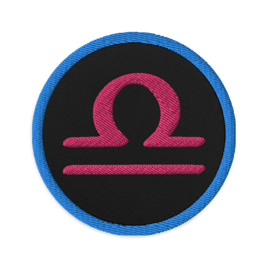 Circular embroidered patch featuring Blue Zodiac Sign Libra, front view