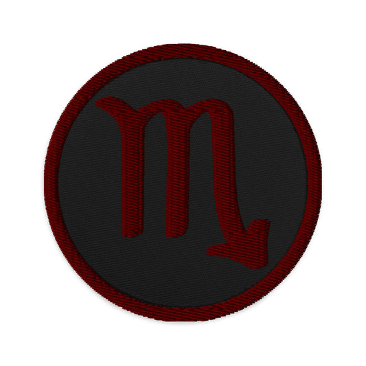 Circular embroidered patch featuring Red Zodiac Sign Scorpio, front view