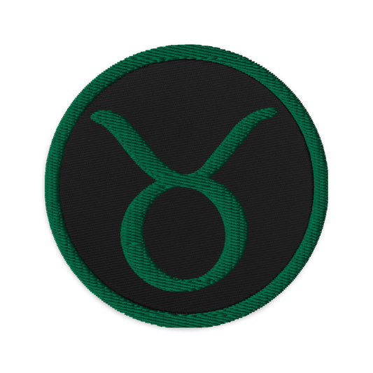 Circular embroidered patch featuring Green Zodiac Sign Taurus, front view