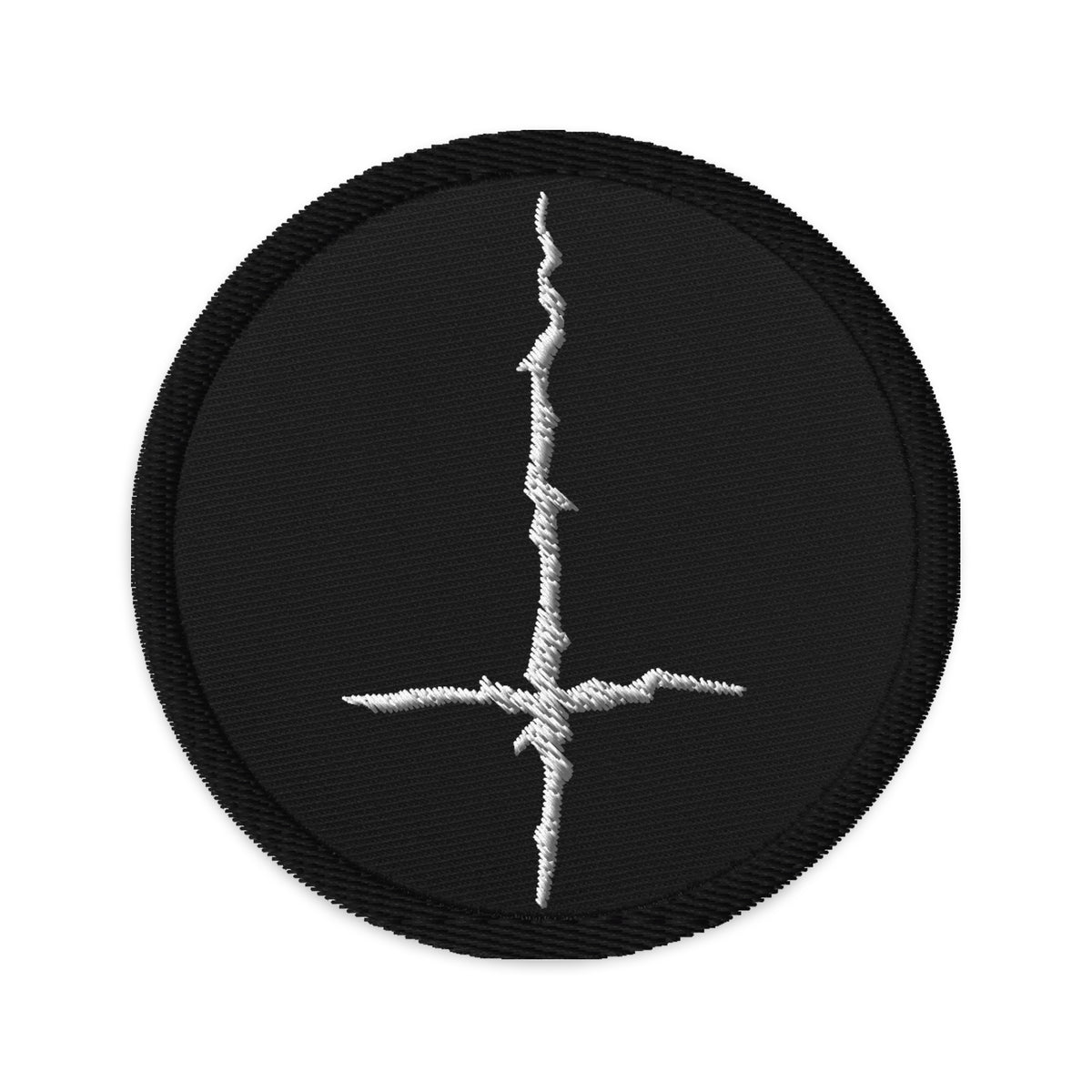 Circular embroidered patch featuring White Black Metal Style Inverted Cross, front view