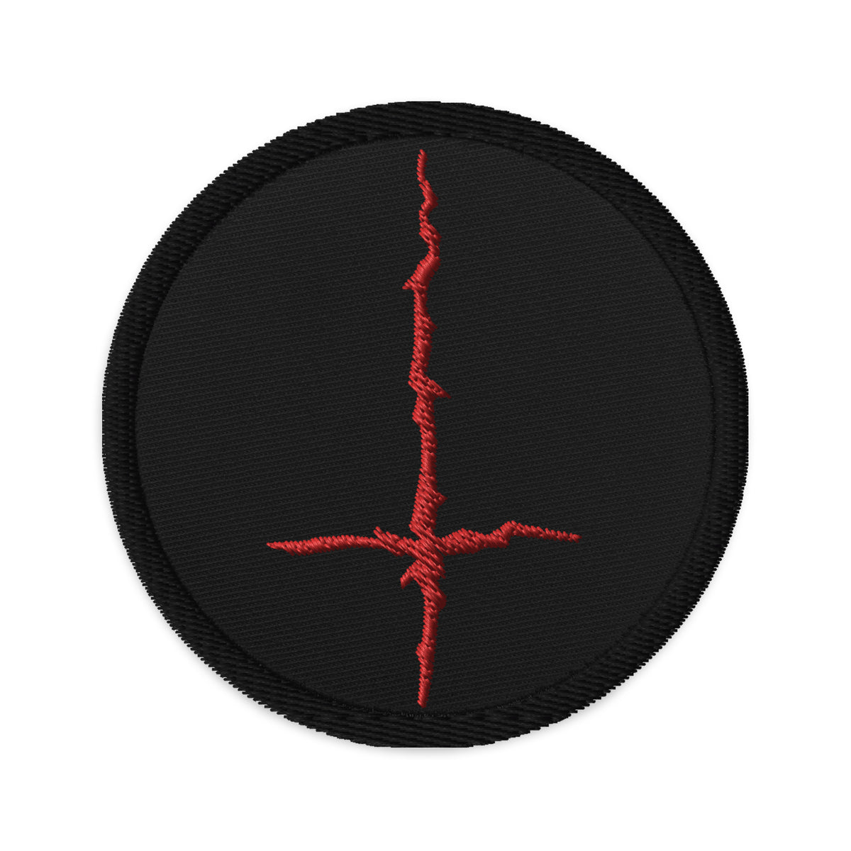 Circular embroidered patch featuring Red Black Metal Style Inverted Cross, front view