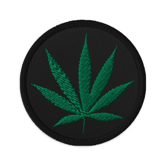 Circular embroidered patch featuring Pot Leaf Marijuana, front view