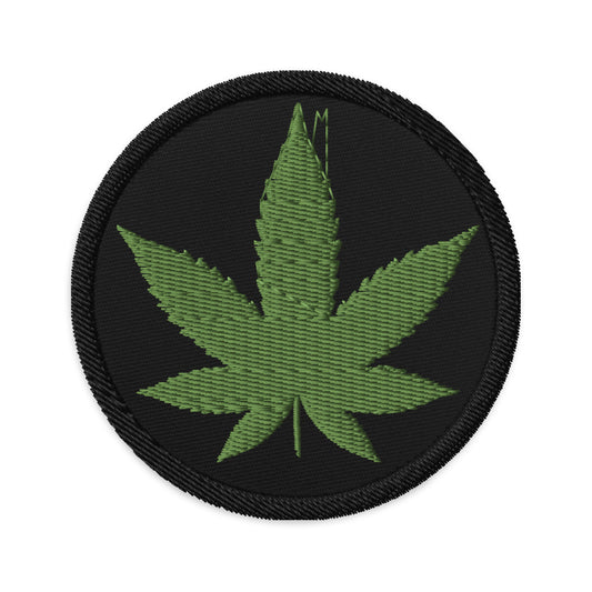 Circular embroidered patch featuring Marijuana Leaf Cannabis Plant, front view