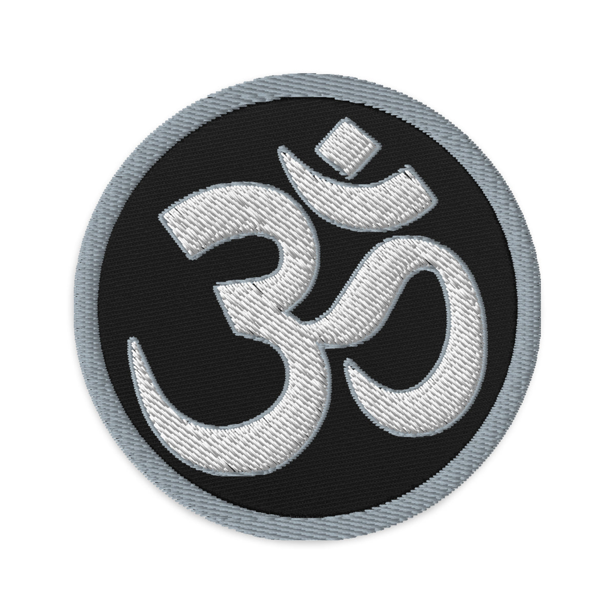 Circular embroidered patch featuring OM Sacred Spiritual Symbol, front view