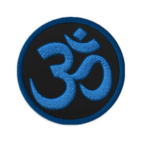 Circular embroidered patch featuring OM Sacred Spiritual Symbol, front view
