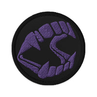 Circular embroidered patch featuring Vampire Fangs Novelty Halloween Toy Trick or Treat, front view