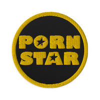 Circular embroidered patch featuring Porn Star Logo, front view