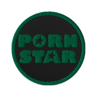 Circular embroidered patch featuring Porn Star Logo, front view