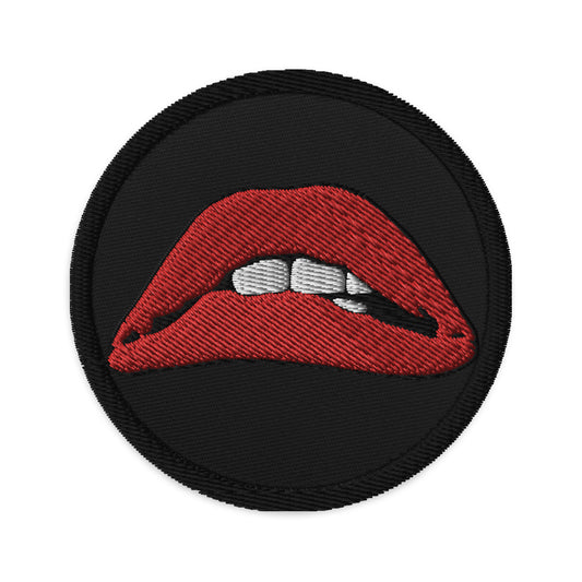 Circular embroidered patch featuring Rocky Horror Picture Show Lips, front view