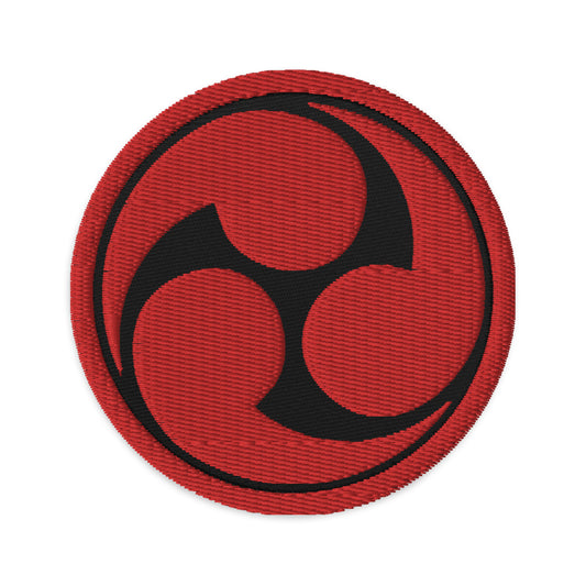 Circular embroidered patch featuring Tomoe Mitsudomoe Japanese Symbol, front view