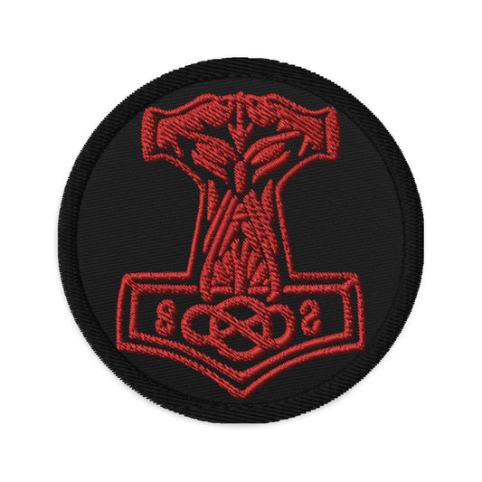 Circular embroidered patch featuring Odin War Hammer, front view