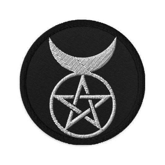 Circular embroidered patch featuring The Horned God, front view
