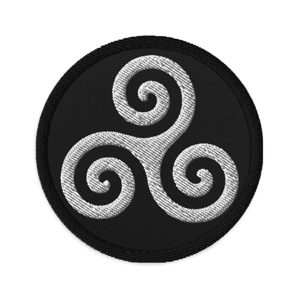Circular embroidered patch featuring Triskelion or Triskeles Spiral, front view