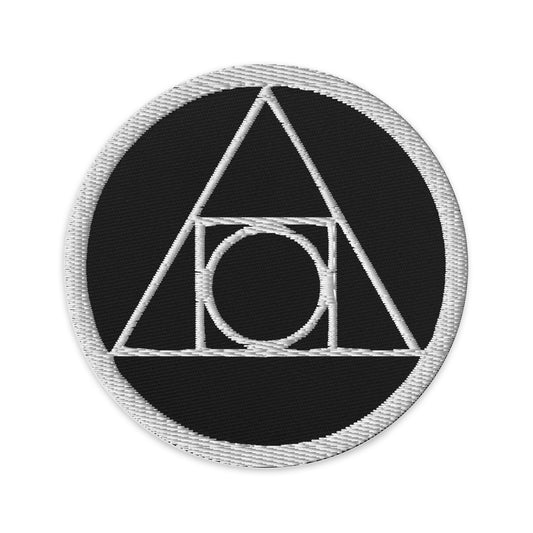 Circular embroidered patch featuring Philosopher's Stone Alchemy Symbol, front view