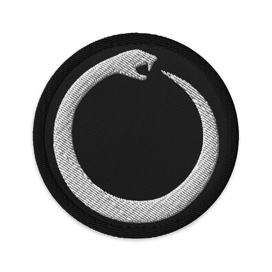 Circular embroidered patch featuring Ouroboros Snake Eating Tail Ancient Alchemy Symbol, front view