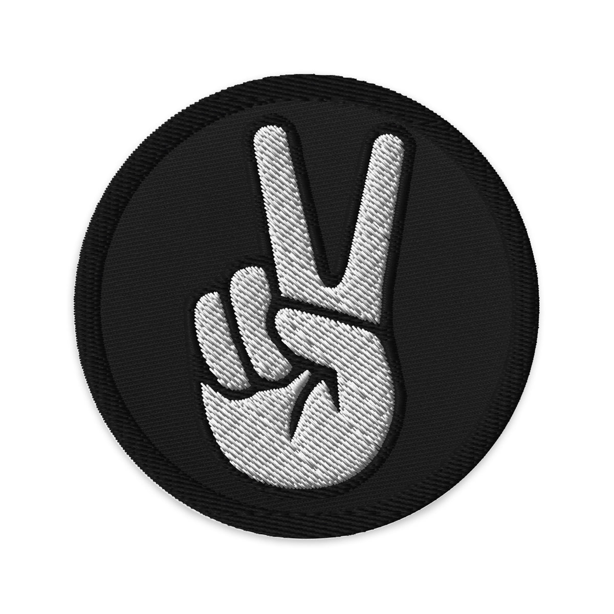 Circular embroidered patch featuring The V Sign for Victory Hand Gesture, front view