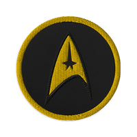 Circular embroidered patch featuring The Delta Insignia Starfleet Badge, front view