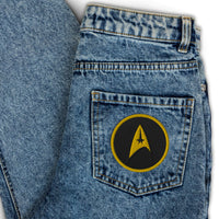 Circular embroidered patch featuring The Delta Insignia Starfleet Badge, front view