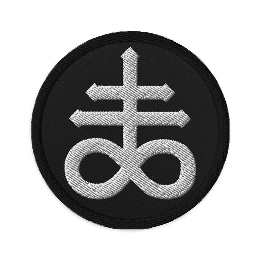 Circular embroidered patch featuring White The Leviathan Cross of Satan, front view