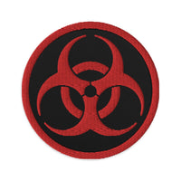 Circular embroidered patch featuring Red Thread Bio Hazard Symbol Warning Sign, front view