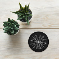 Circular embroidered patch featuring Creepy Spiderweb Halloween, front view