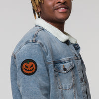 Circular embroidered patch featuring Scary Jack O Lantern Halloween Pumpkin, front view