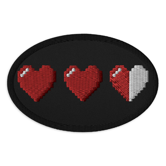 Oval embroidered patch featuring 3 Heart Meter Retro 8 Bit Video Game Pixelated, front view
