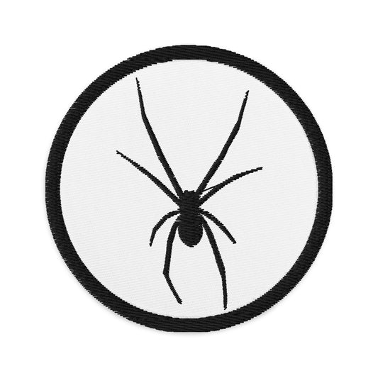Circular embroidered patch featuring Arachnid Creepy Black Widow Spider, front view