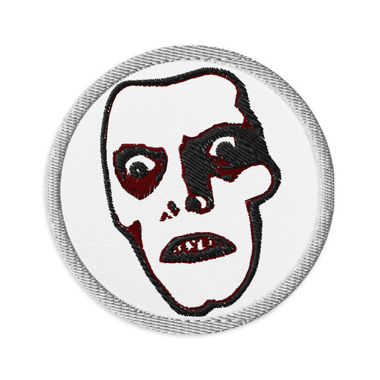Circular embroidered patch featuring Horror Monster Pazuzu "Captain Howdy", front view