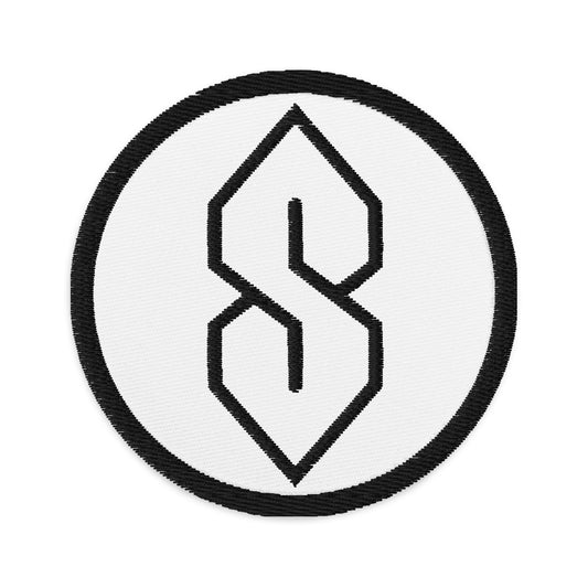 Circular embroidered patch featuring Black Cool S, Graffiti S, Middle School S, front view