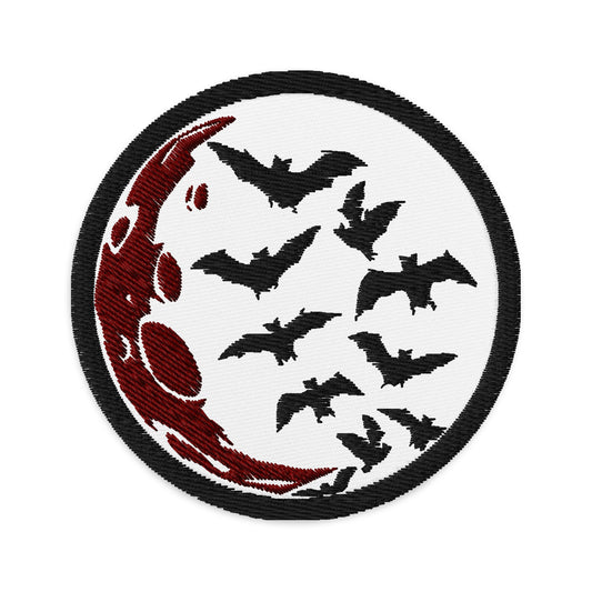 Circular embroidered patch featuring Flying Bats over Blood Moon, front view