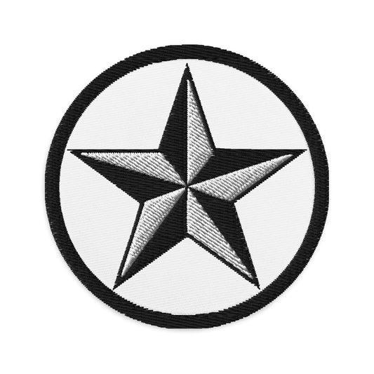 Circular embroidered patch featuring Black Nautical Star North Star, front view