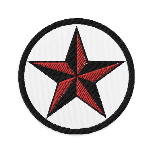 Circular embroidered patch featuring Black Nautical Star North Star, front view