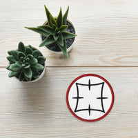 Circular embroidered patch featuring Ancient Japanese Anime Symbol, front view