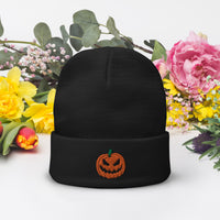 Black cuffed beanie with Scary Jack O Lantern Pumpkin embroidered artwork, front view