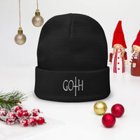 Black cuffed beanie with Dark and Morbid Celebration embroidered artwork, front view
