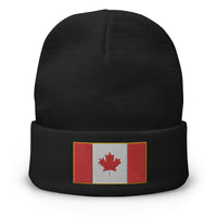 Black cuffed beanie with The National Flag of Canada embroidered artwork, front view